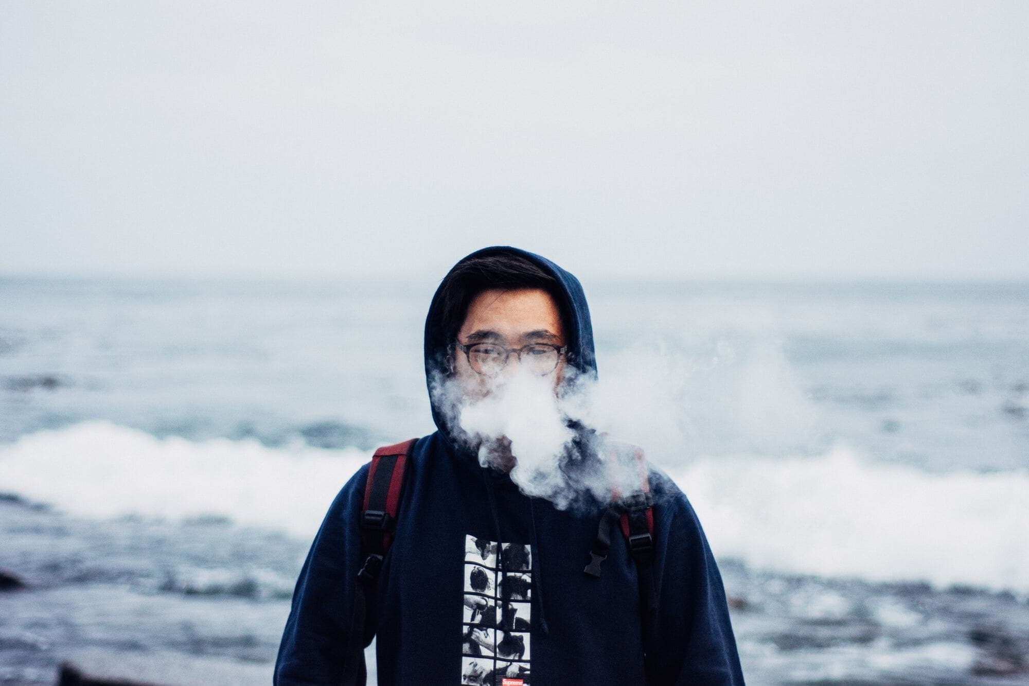 guy blowing smoke